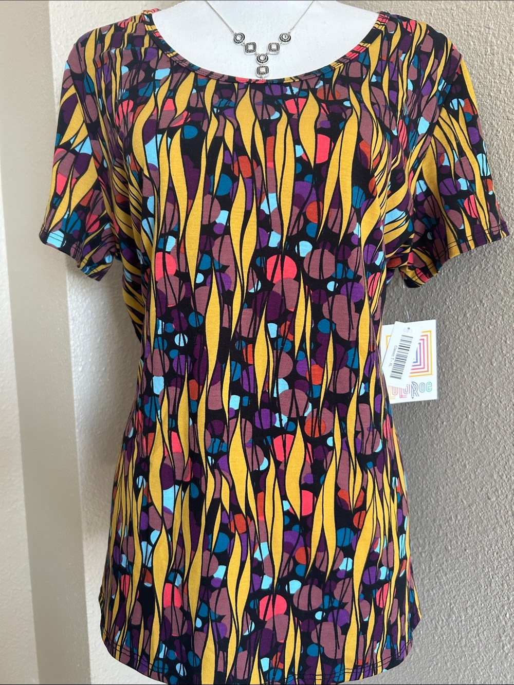 LuLaRoe Women's Multi-Color Short Sleeve Scoop Neck Top with Yellow Accents